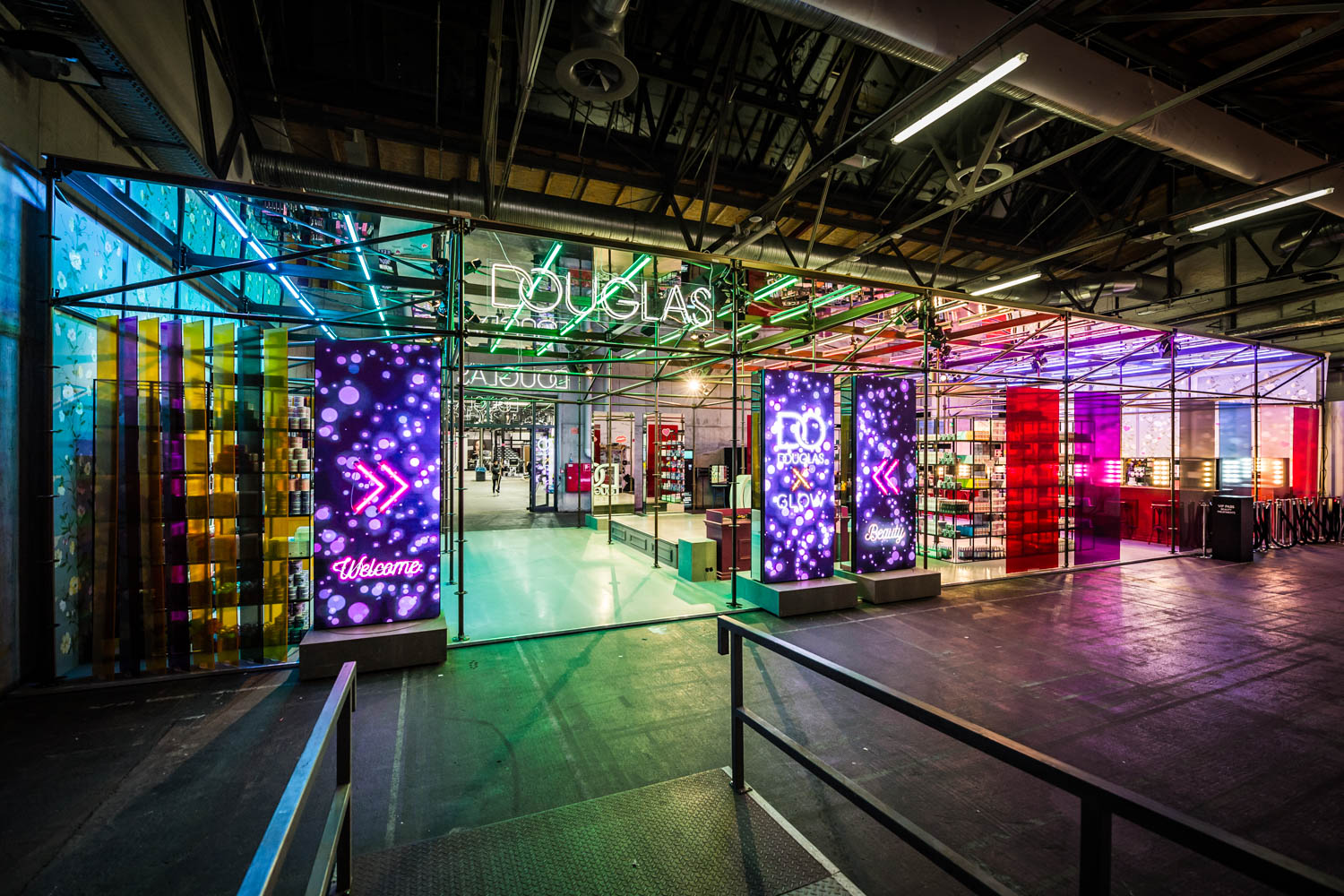 Douglas × Glow booth at night